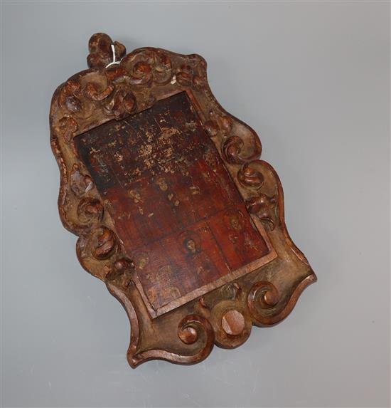 A 19th century Russian or Greek painted wood icon, cartouche frame
